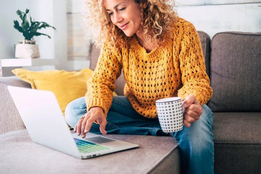 Woman reviewing disability insurance coverage on a laptop